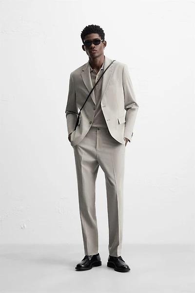 TEXTURED SUIT PANTS