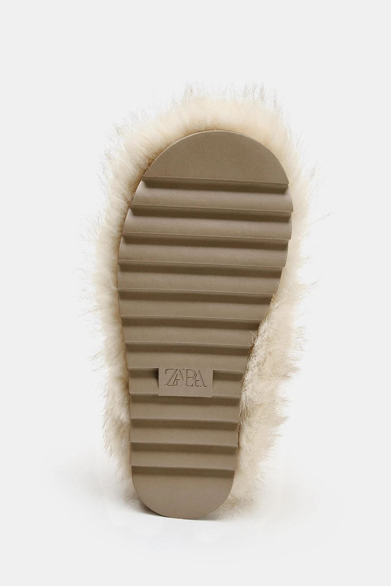 BOTTES EFFET FOURRURE AVEC BRIDE COLLECTION SKI