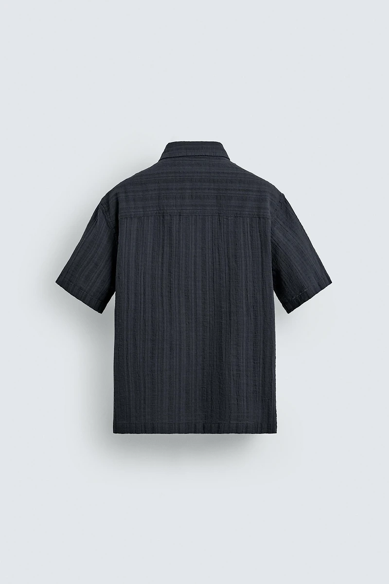 CHEMISE POLO STRUCTURÉE À RAYURES