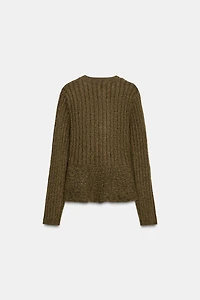 GILET EN MAILLE CANNELÉ PEPLUM
