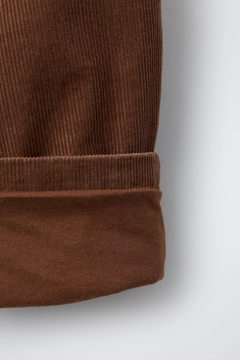 PANTALON EN VELOURS CÔTELÉ BOUTONS DOUBLÉ