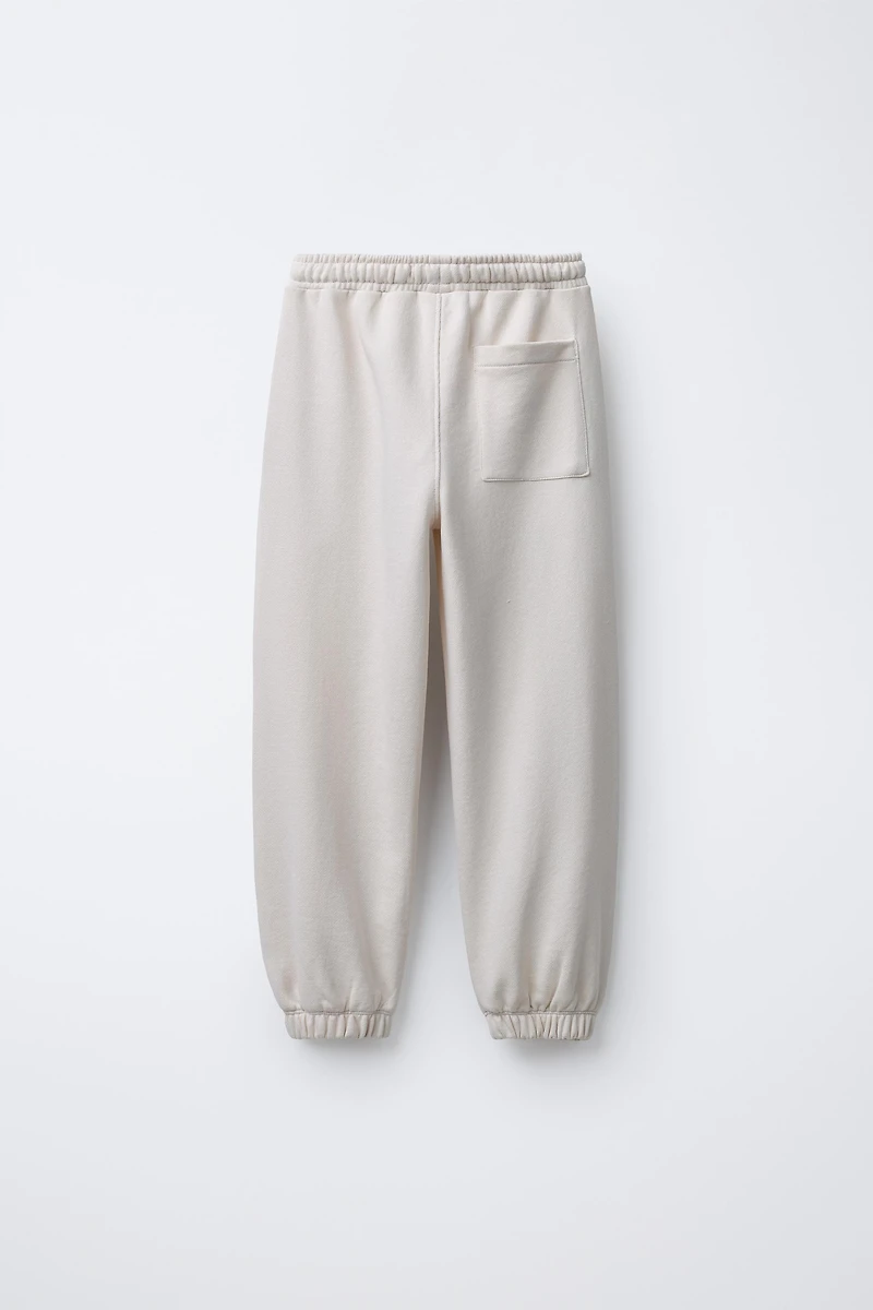 GRAFFITI PRINT JOGGER PANTS