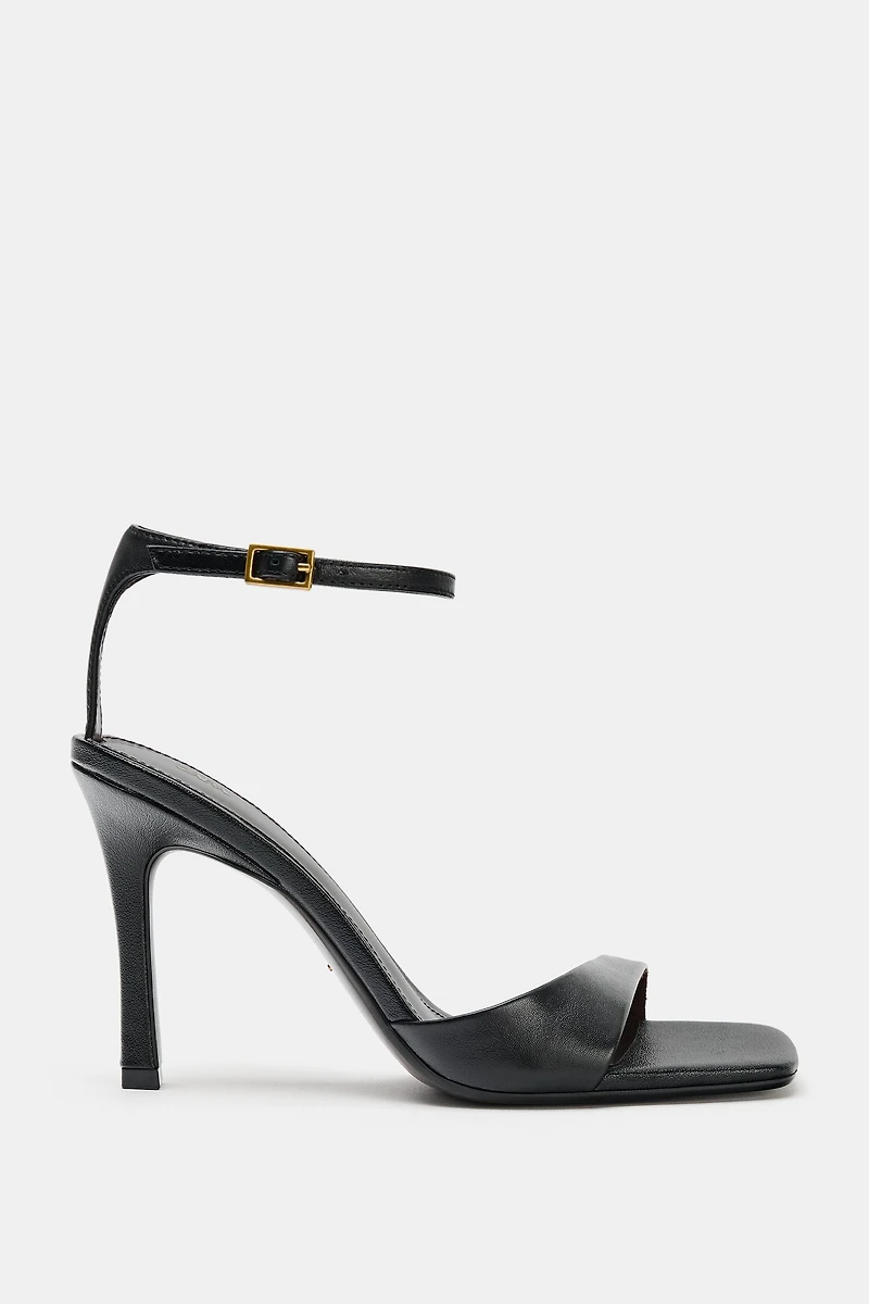 ASYMMETRIC LEATHER HEELED SANDALS