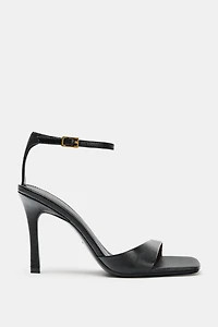 ASYMMETRIC LEATHER HEELED SANDALS