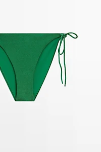 Bas de bikini à nœud brillant