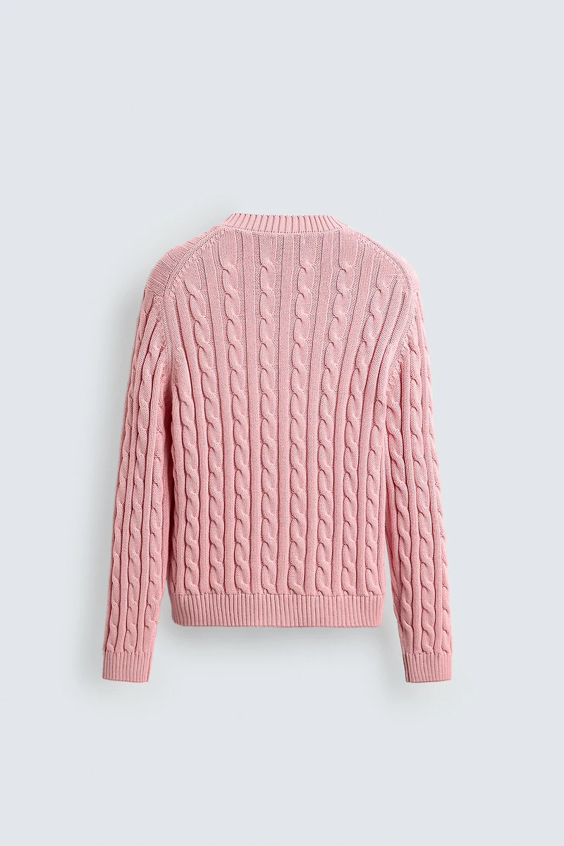 TEXTURED WOVEN JUMPER