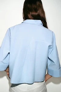SHORT SHIRT WITH STRIPED FLAPS