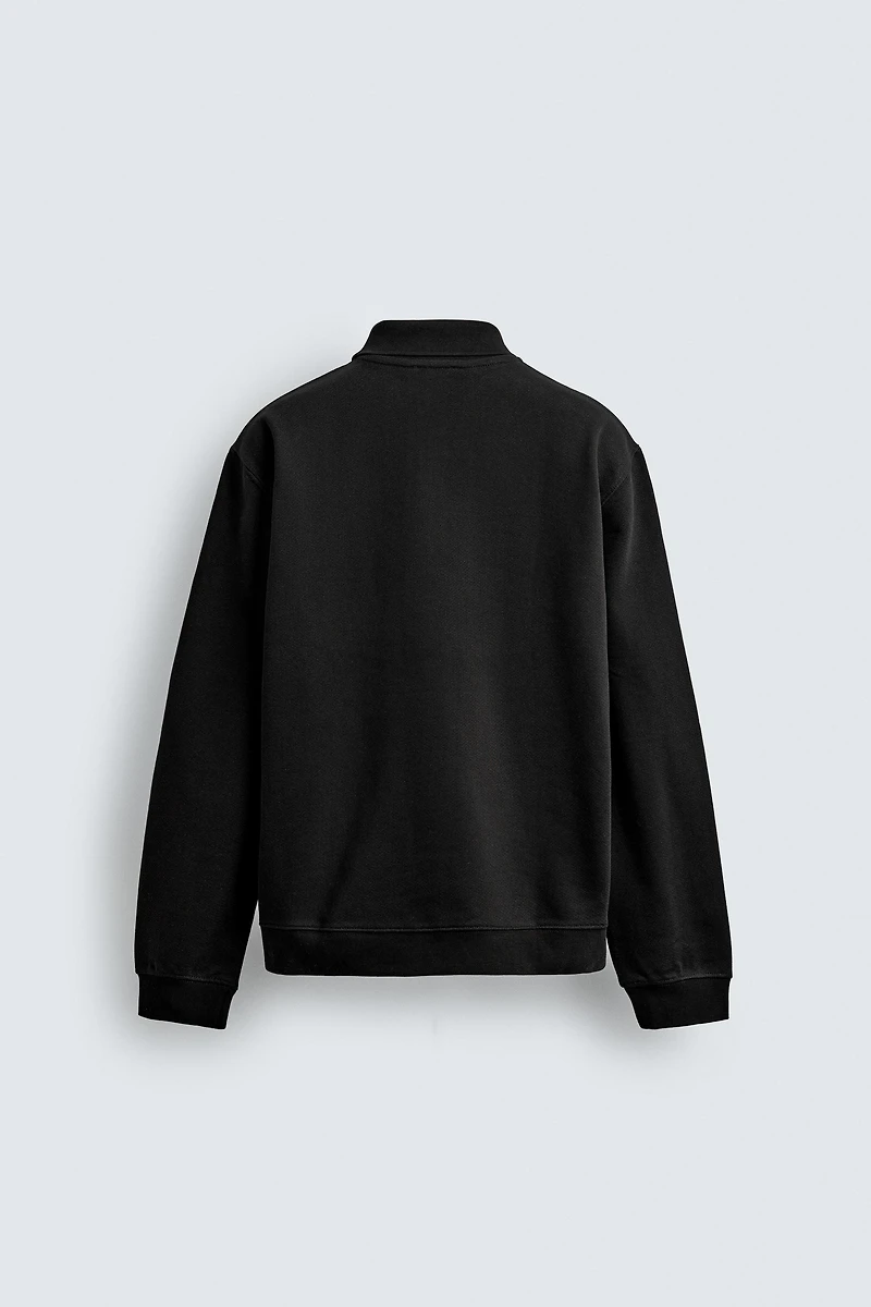 REGULAR FIT TEXTURED POLO SHIRT