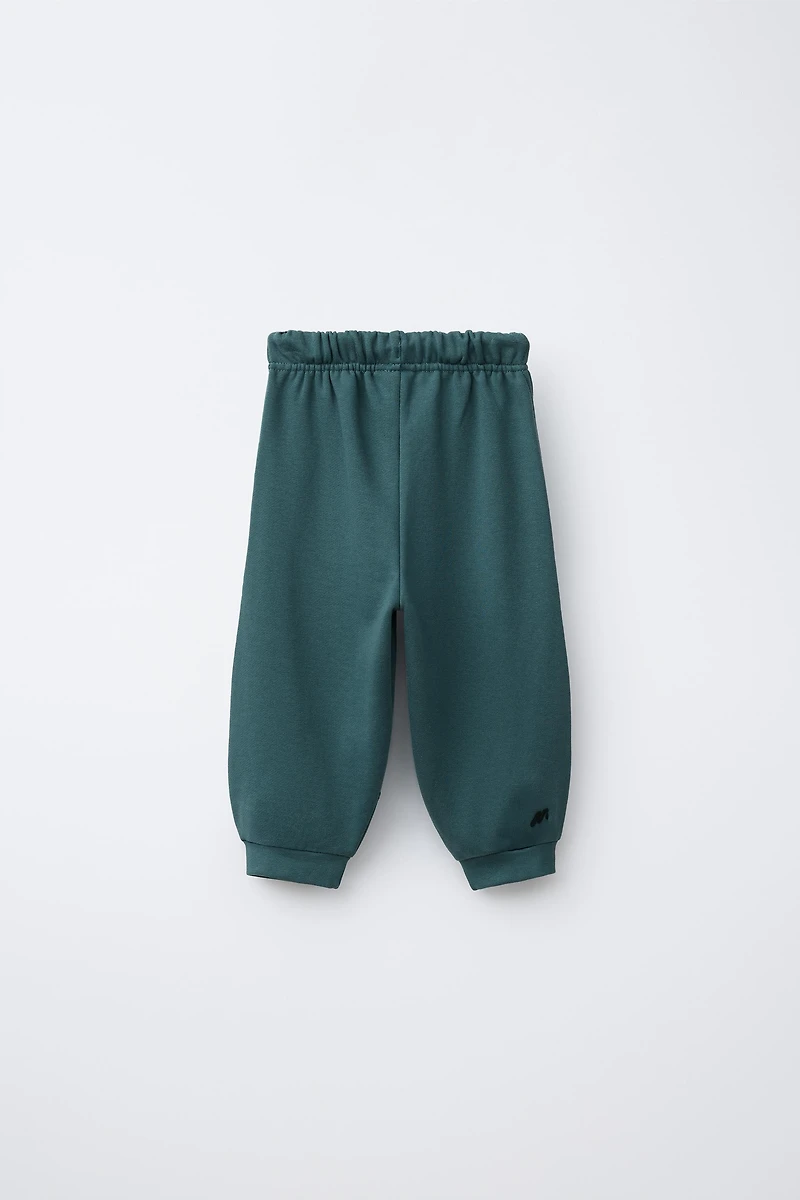 CUT-OUT JOGGER PANTS