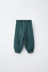 CUT-OUT JOGGER PANTS
