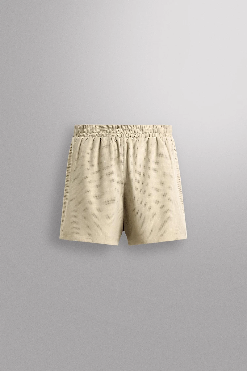 COMBINED PERFORATED SHORTS