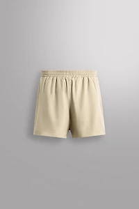 COMBINED PERFORATED SHORTS