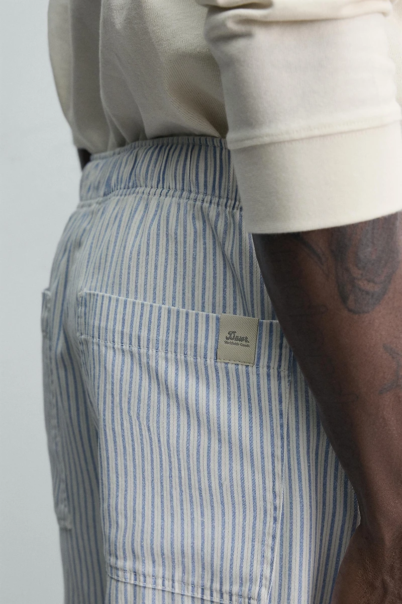 STRIPED BAGGY FIT PANTS