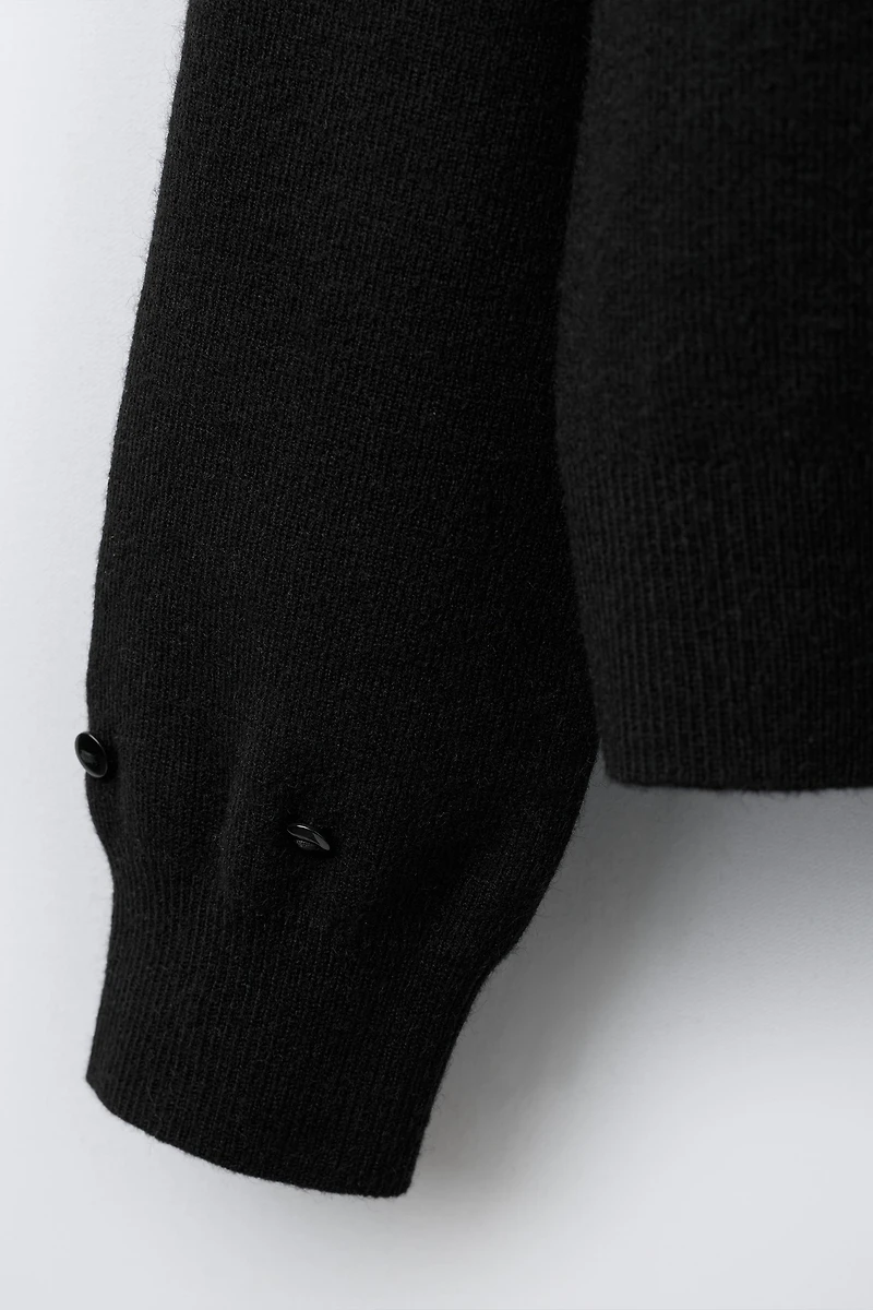 GILET EN MAILLE PLUMES DÉTACHABLES