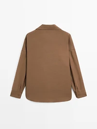 Flowing shirt with hidden buttons