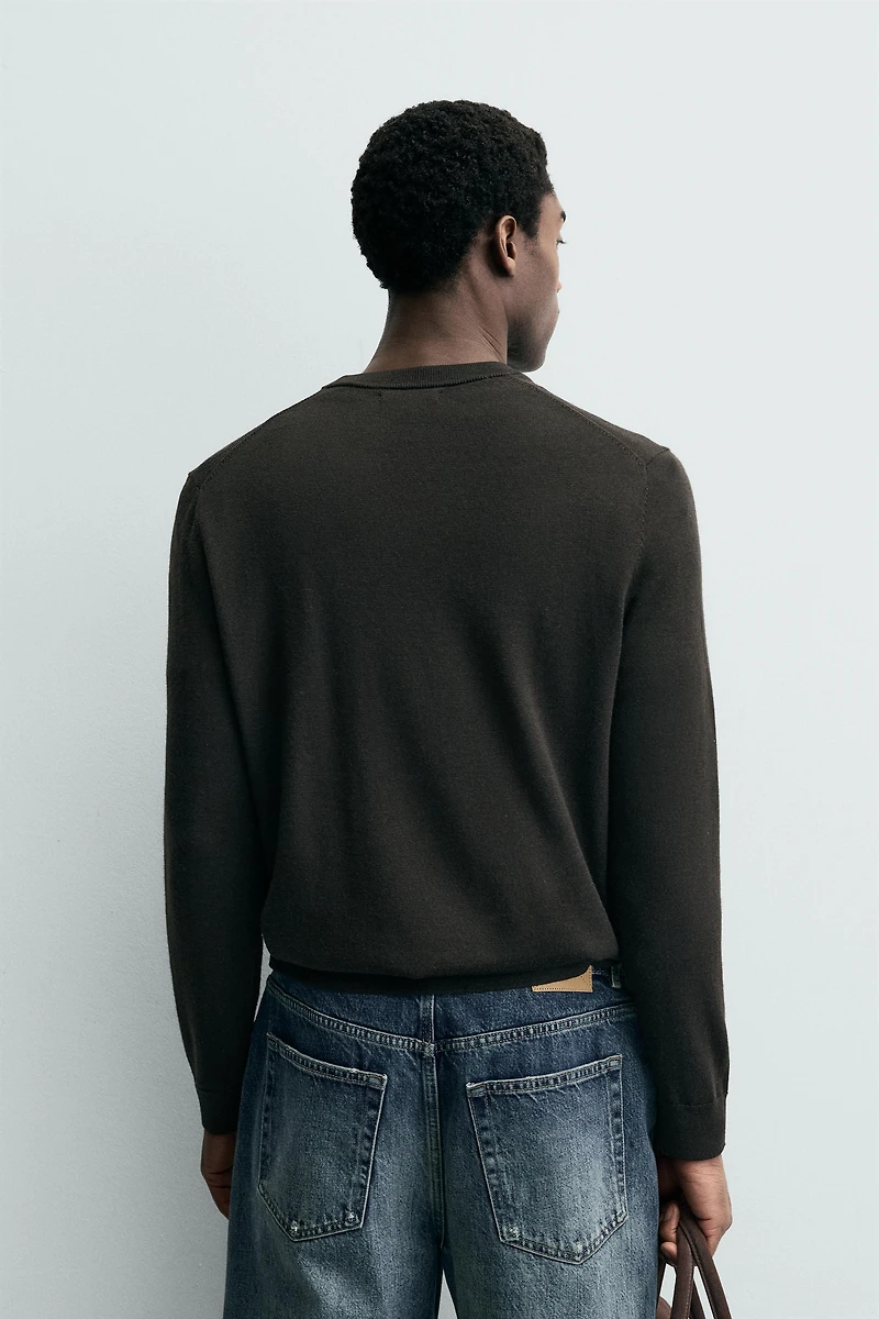 PULL COL EN V 100 % LAINE