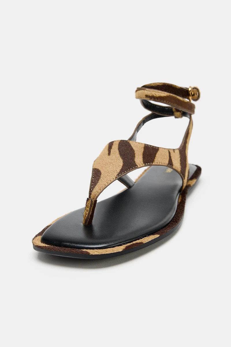 ANIMAL PRINT LEATHER SANDALS WITH FUR EFFECT