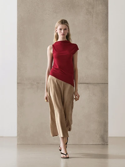 100% cotton top with asymmetric detail