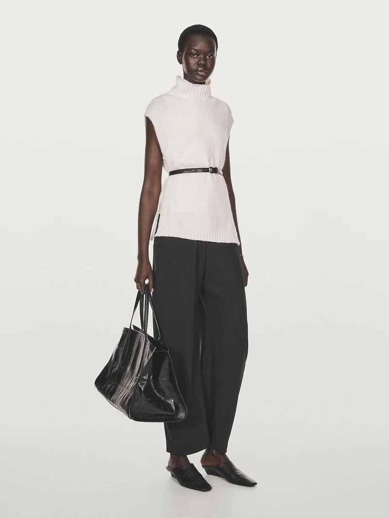 Sleeveless high neck sweater