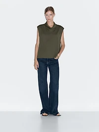 Flowing blouse with draped neck detail