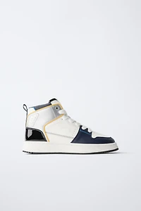 HIGH TOP SNEAKERS WITH PIECES