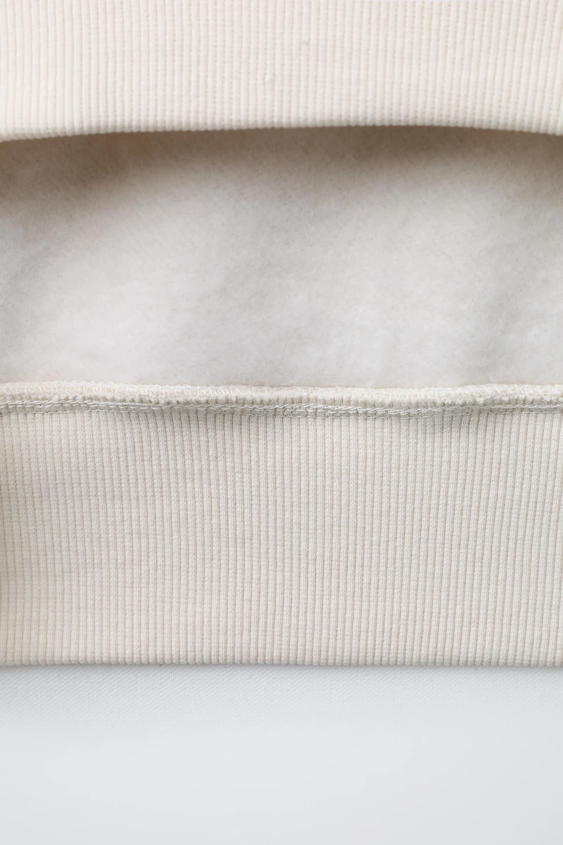 FLOCKED TEXT PRINTED HOODIE