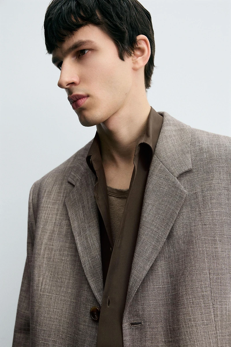 TEXTURED SUIT JACKET