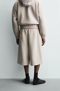 SHORT EFFET NÉOPRÈNE À PINCES