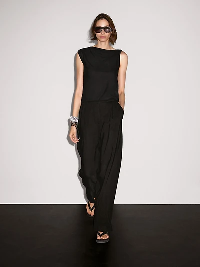 Asymmetric top with knot detail