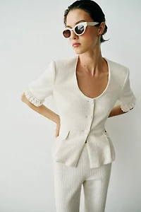 SHORT-SLEEVE RUFFLED PEPLUM JACKET