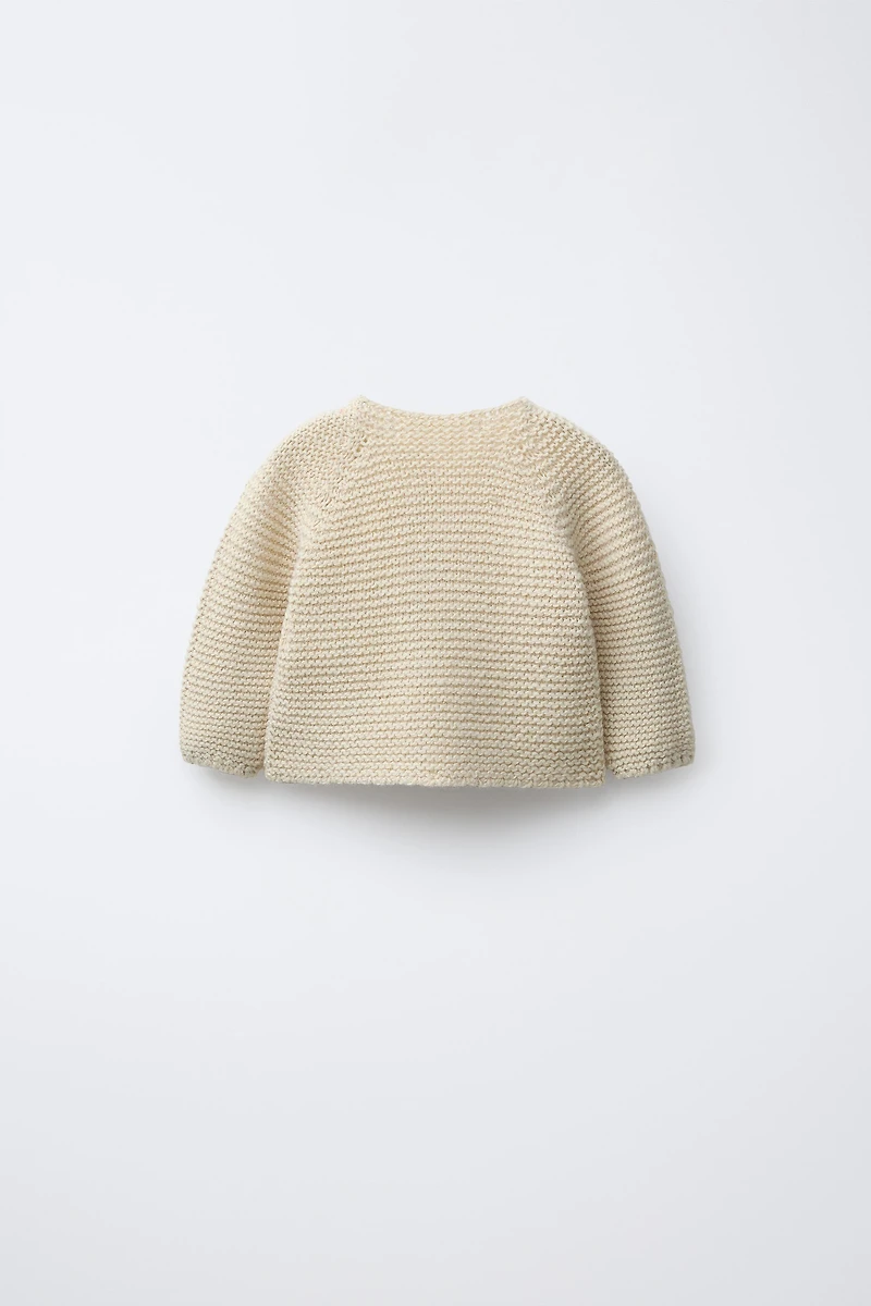 GILET EN GROSSE MAILLE