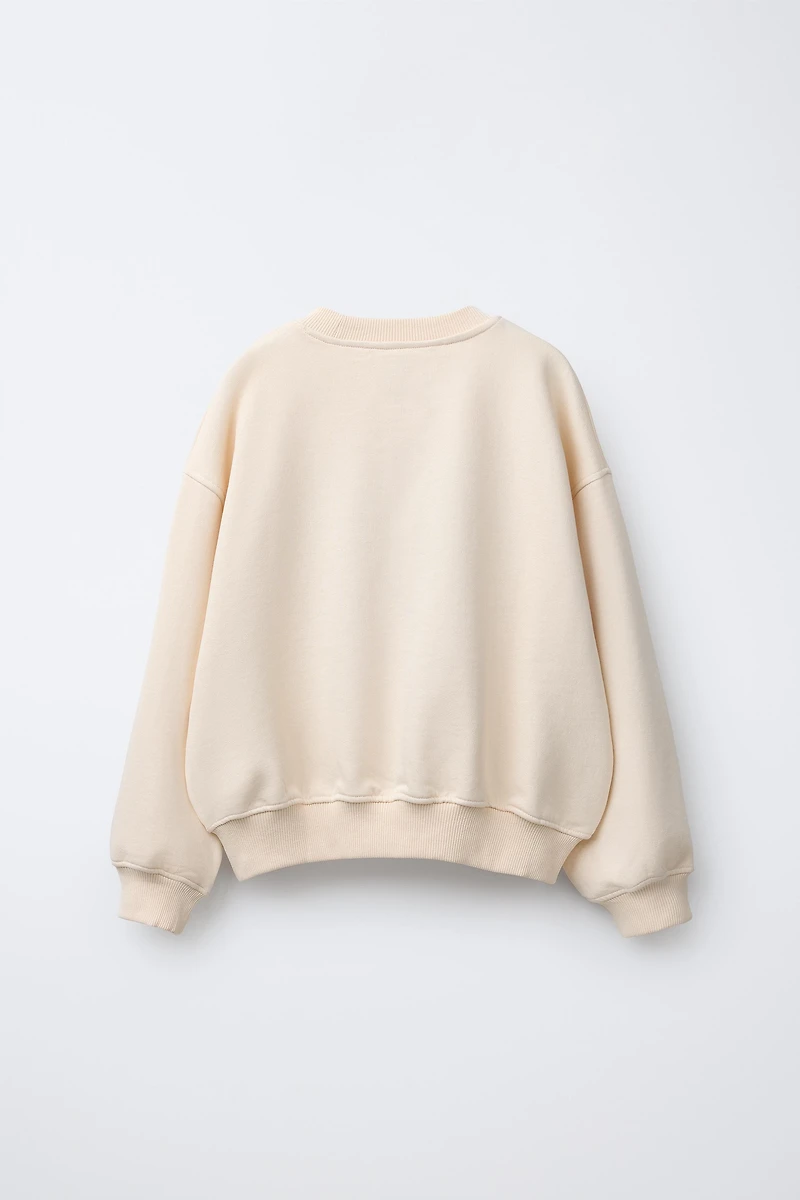 SWEAT BRODÉ AVEC LACET