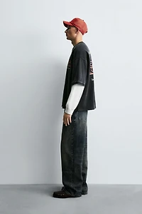 SWEAT DÉLAVÉ À INSCRIPTIONS IMPRIMÉES