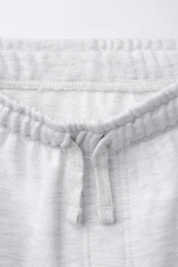 STRAIGHT FIT EMBOSSED TEXT TERRY SHORTS