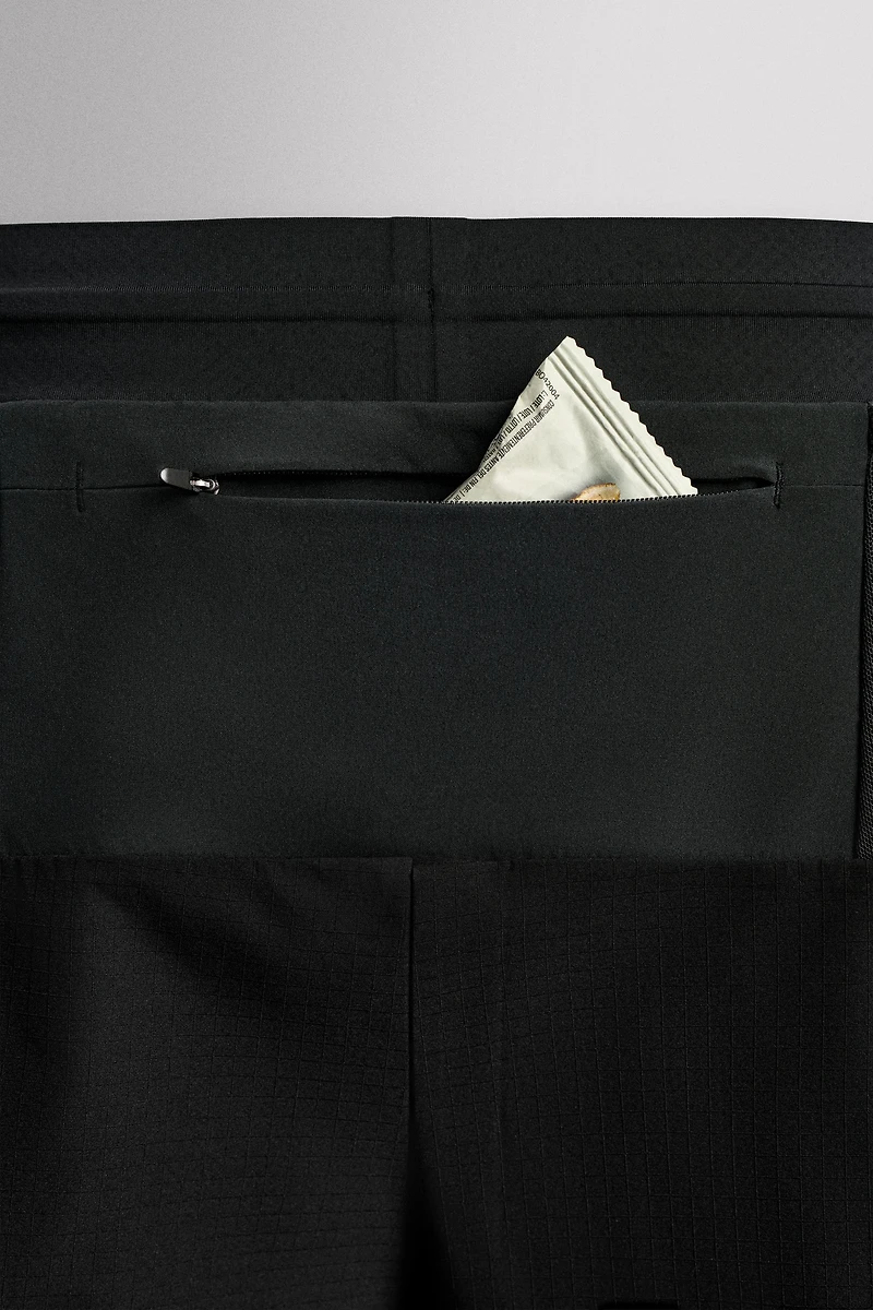 COLOR BLOCK RUNNING SHORTS