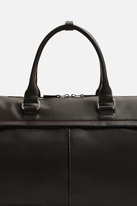 TEXTURED TRAVEL BAG