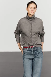 Turtleneck cardigan with button detail