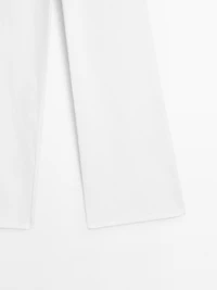 Textured wide-leg denim-effect trousers