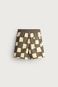 MAILLOT DE BAIN LONG À CARREAUX CONTRASTÉS