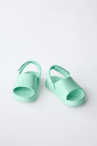 RUBBERIZED SLIDES