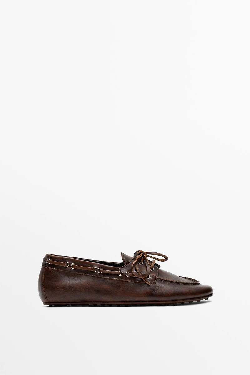 Leather lace-up boat shoe