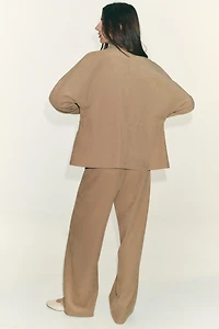 VESTE À POCHES ET TAILLE AJUSTABLE