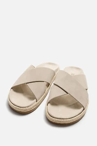 CROSSED LEATHER SANDALS
