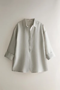BUTTONED LINEN JUMPSUIT