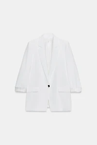 VESTE À MANCHES RETROUSSÉES ET POIGNETS IMPRIMÉS