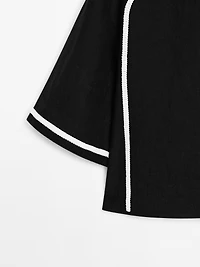 Blouse with contrast embroidery