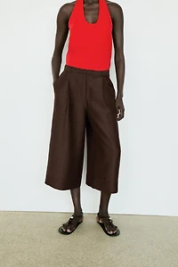 Long flowing Bermuda shorts with scarf detail