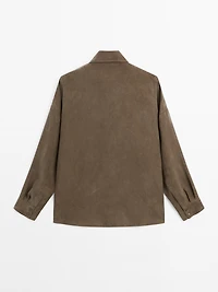 Blouse with zip on the chest