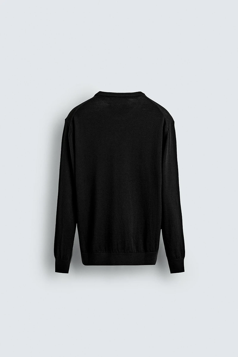 100% WOOL SWEATER