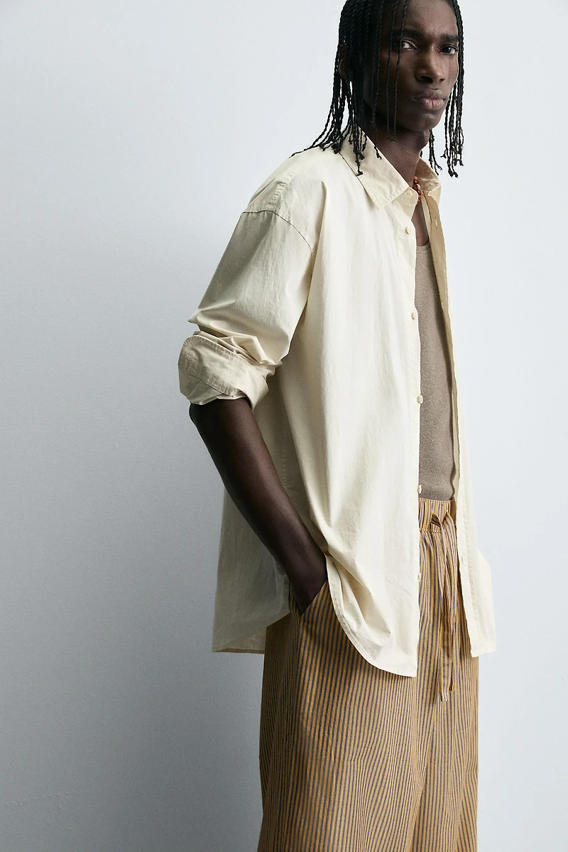 STRIPED OVERSIZED FIT PANTS